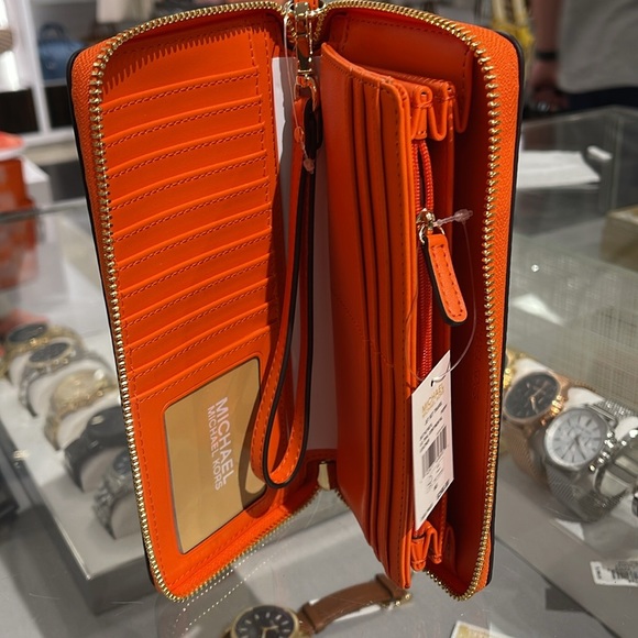 MICHAEL KORS JST
Leather Continental Wristlet Phone Case Wallet
Poppy
NWT - Picture 9 of 16